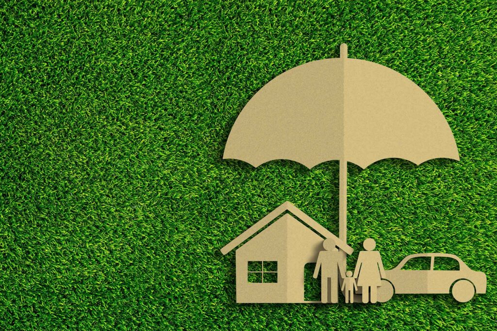 An umbrella covers a family, their home, and their car.
