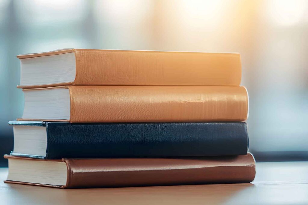 Four books stacked on their sides.