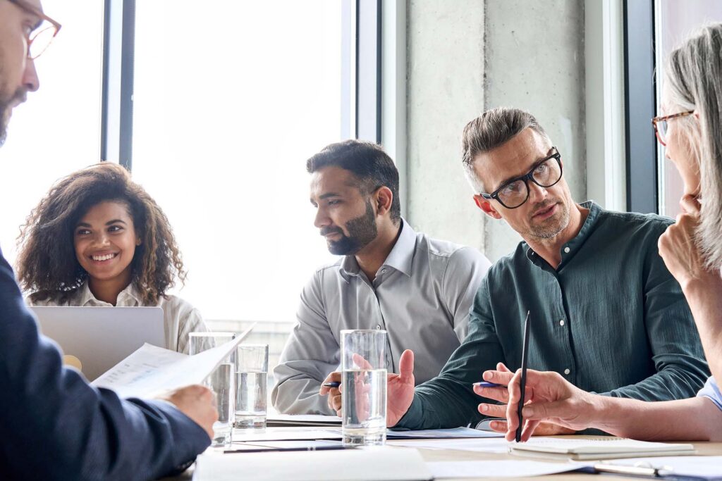 Employees at a legal meeting.